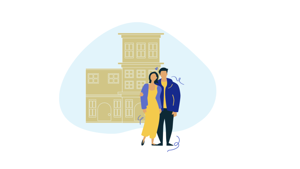 Young couple in front of townhome